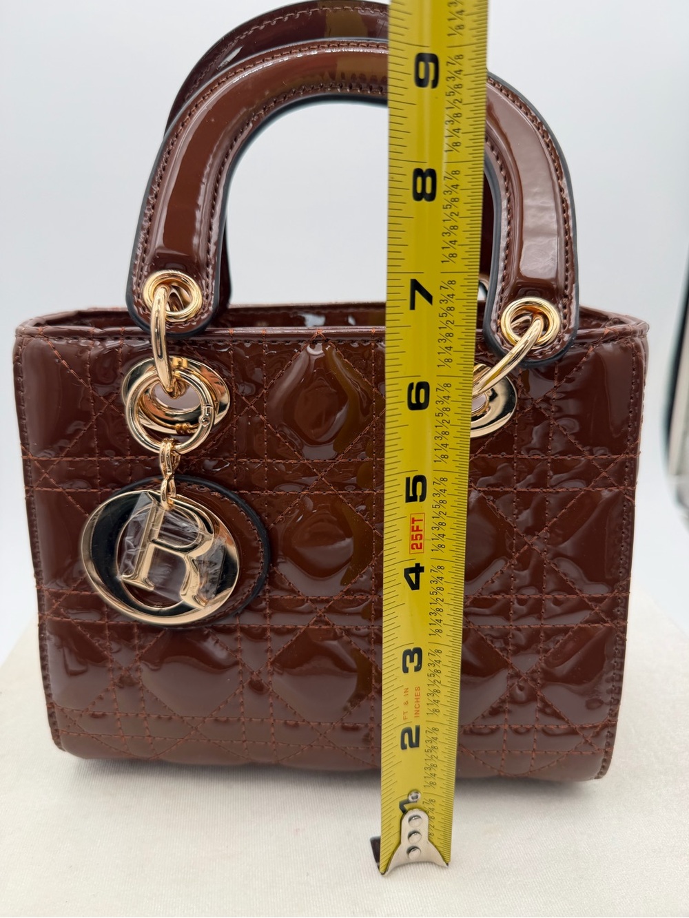 Beautiful, Brown Patent leather mini Bag with Gold Charm - Picture 12 of 15